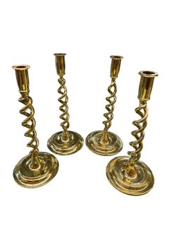 Set of Four Brass Twist Candlesticks