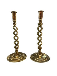 Set of Four Brass Twist Candlesticks