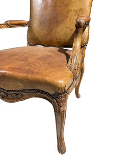 French Carved Wood and Leather Armchair